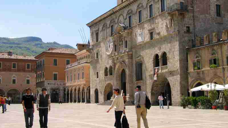 Charming view of Piazza del Popolo in Ascoli Piceno, Italy, featuring medieval architecture and lively atmosphere., tags: scoprire arcevia: gioiello - pexel